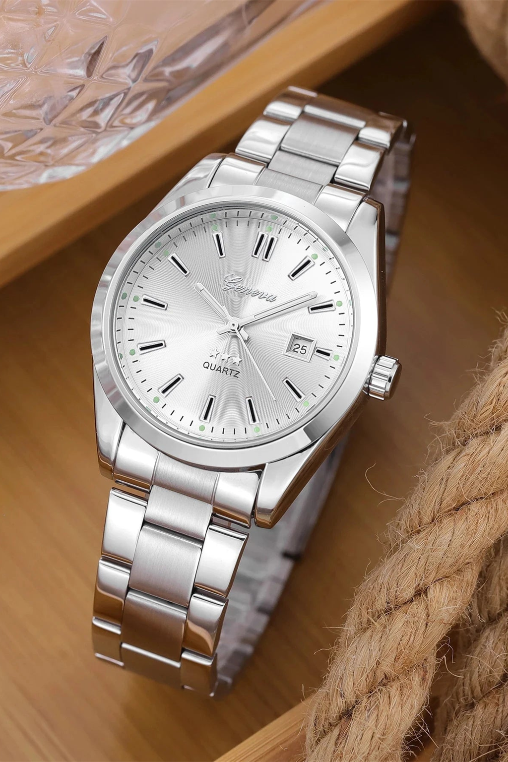 Ellery Watch, round steel-look case with a silver dial on a link bracelet